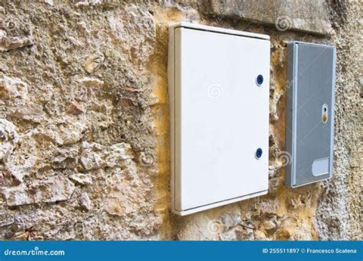 Can an electrical junction box be hidden in the wall
