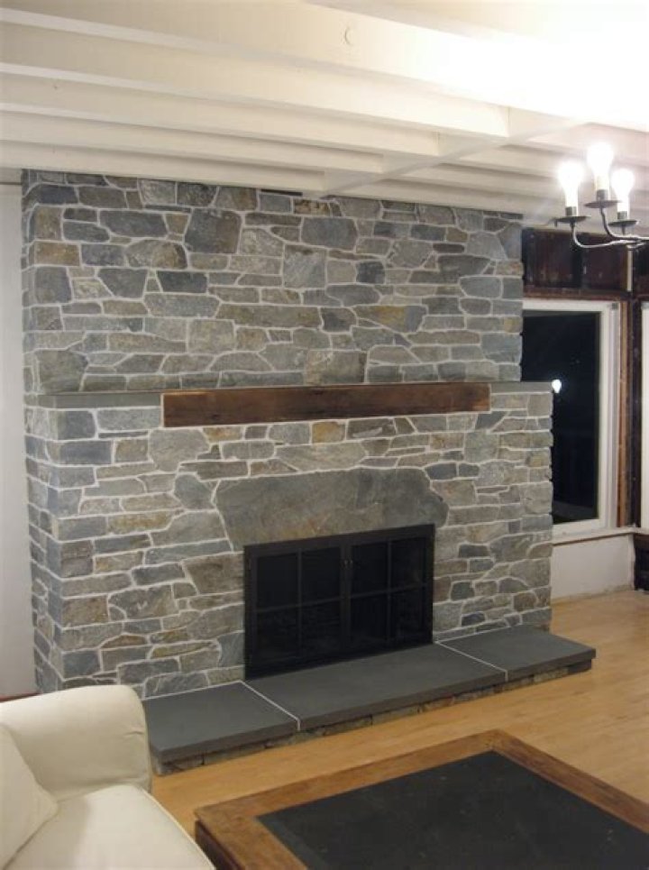 Can you cover a brick fireplace with tile