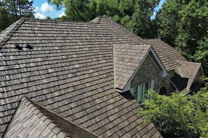Do architectural shingles cost more