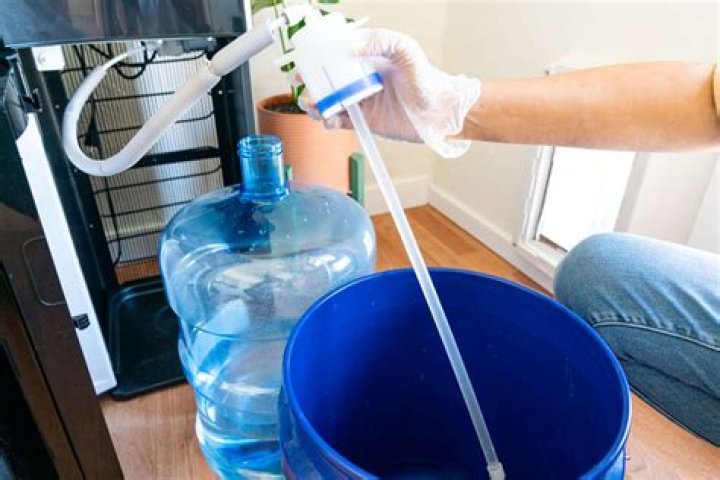 How do you clean a milk cooler