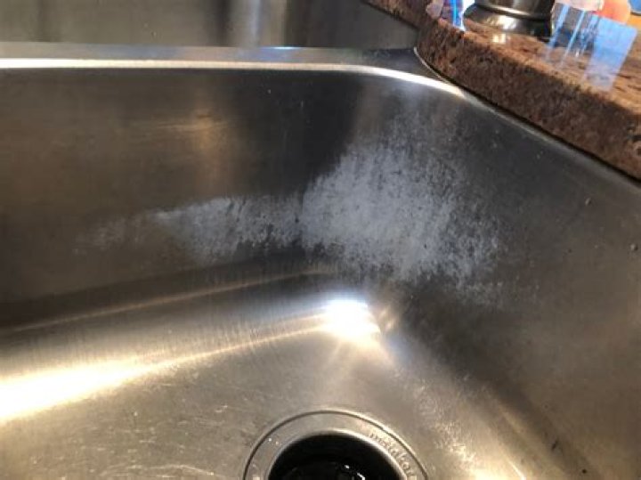 How do you clean a Moen stainless steel sink