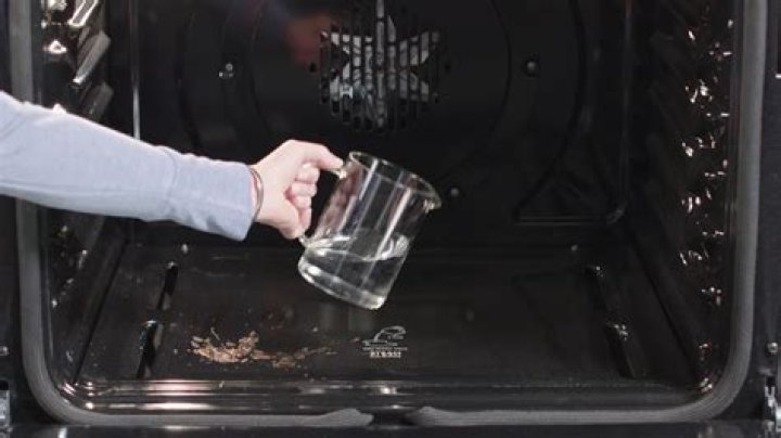 How do you clean a steam boiler