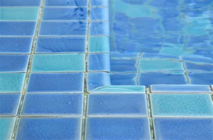 How do you remove pool tile