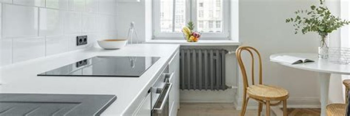 Is it OK to put a fridge freezer next to a radiator