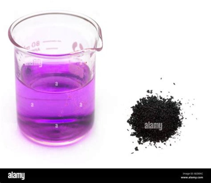 When a crystal of potassium permanganate is placed in a beaker
